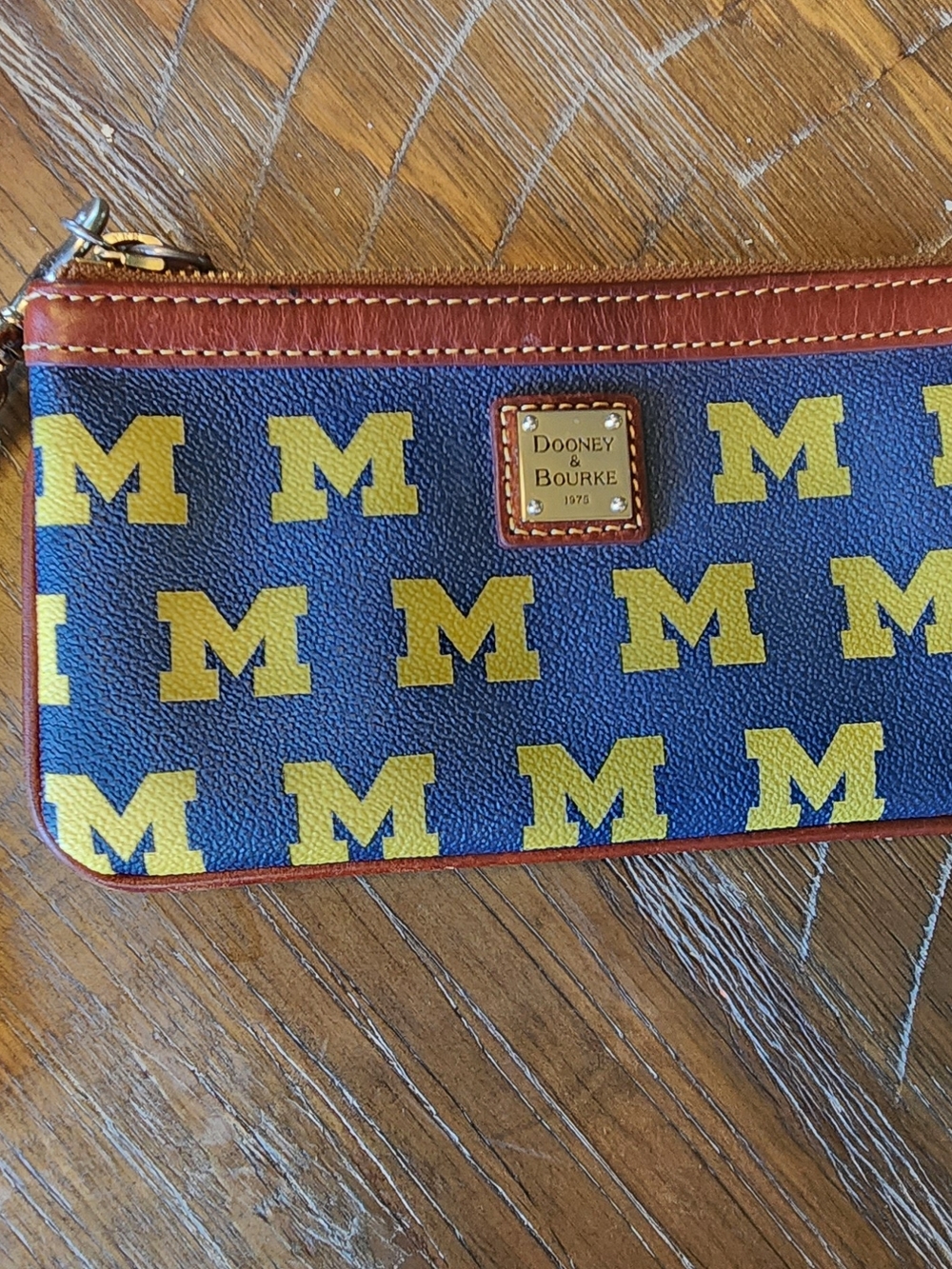 Dooney & Bourke Navy and Yellow University M Zip Wristlet with Brown Trim